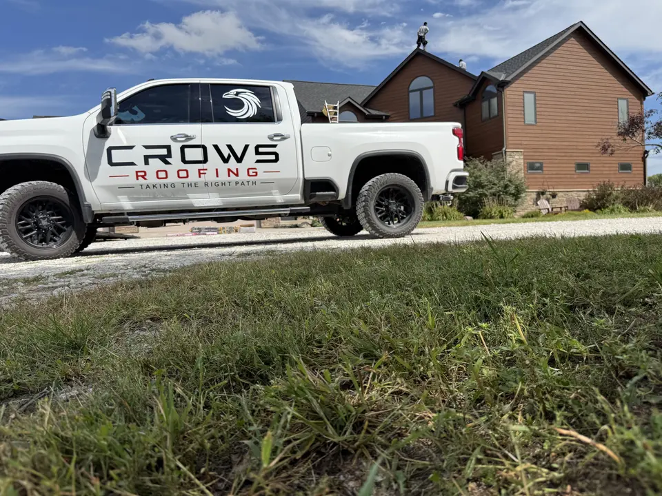 Crows Roofing truck at a residential roofing project