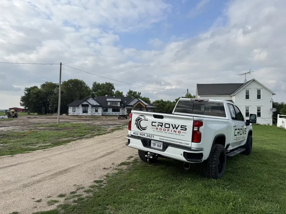 Crows Roofing truck at a residential worksite