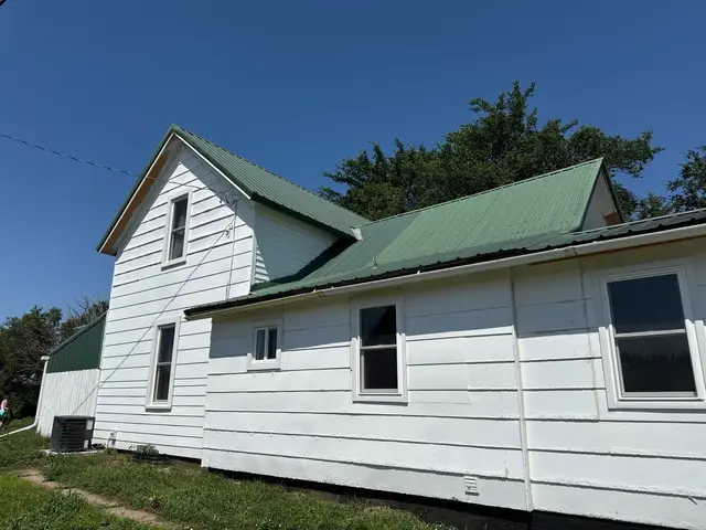 Standing-Seam Metal Roof and Vinyl Siding in Pender, NE – photo 7