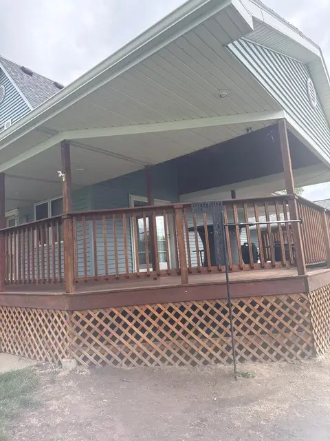 Roof Replacement on a Wrap-Around Porch Home in West Point, NE – photo 2